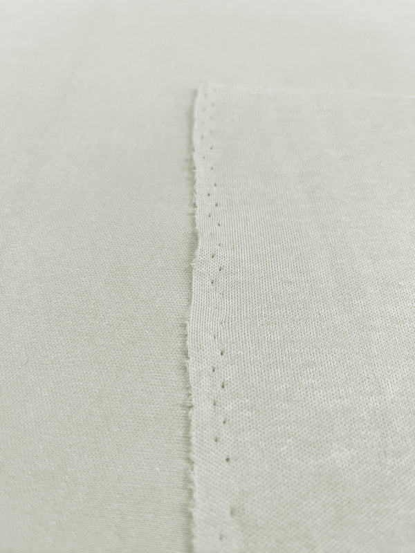 Tessuto interlock di cotone bianco