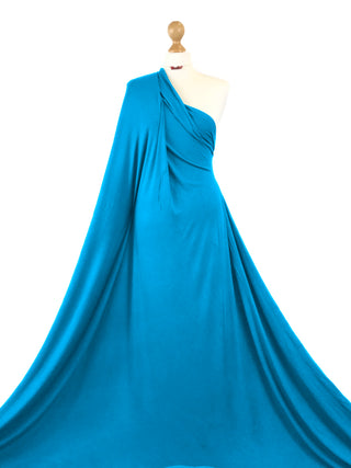 Buy turquoise Viscose Jersey 4 Way Stretch Fabric