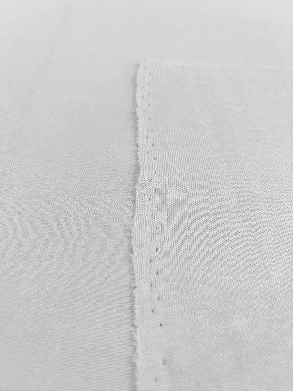 Tessuto interlock di cotone bianco
